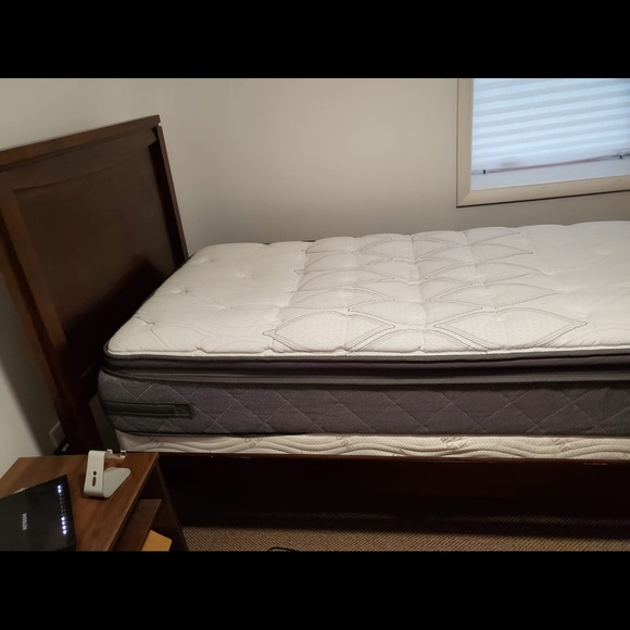 Other - Twin size bed with mattress and box spring.